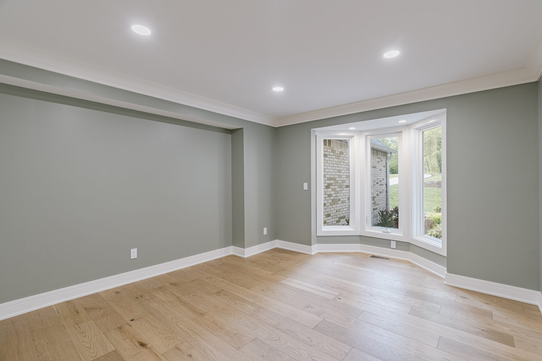 Secondary bedroom in muted sage